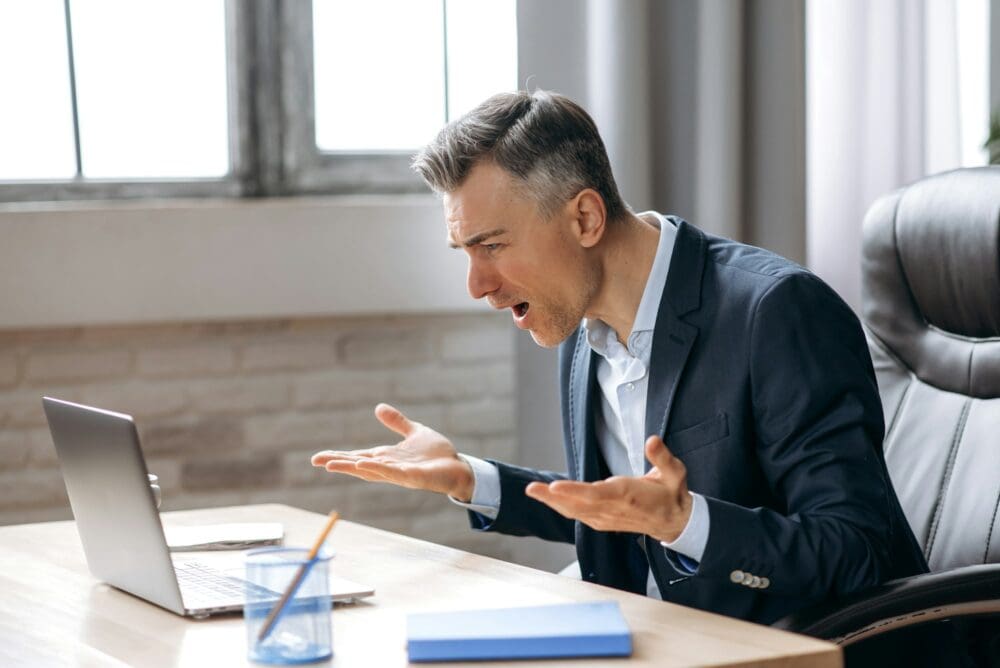 business man caucasian successful online confused shocked surprised